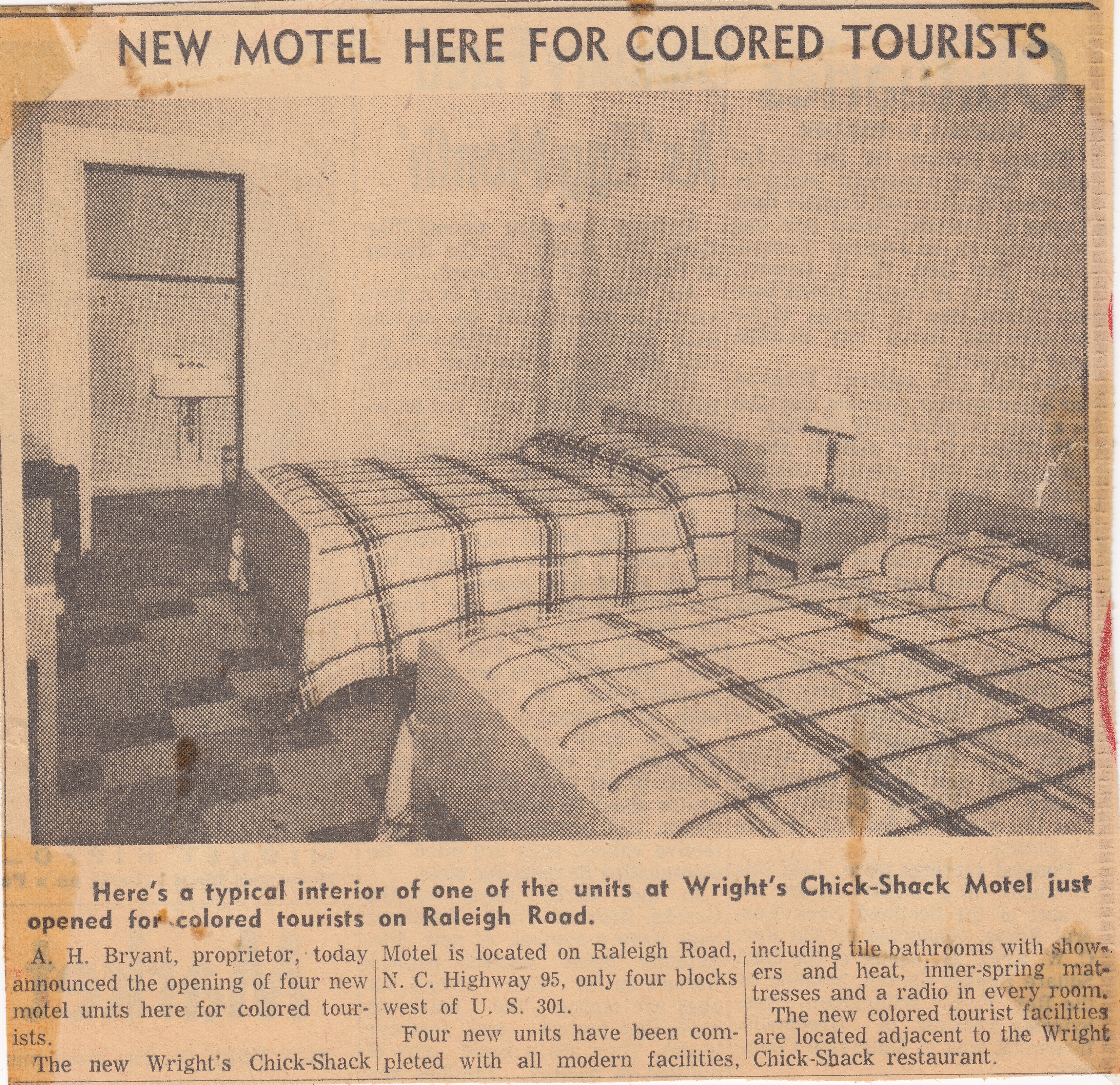Newspaper clipping of motel from family scrapbook