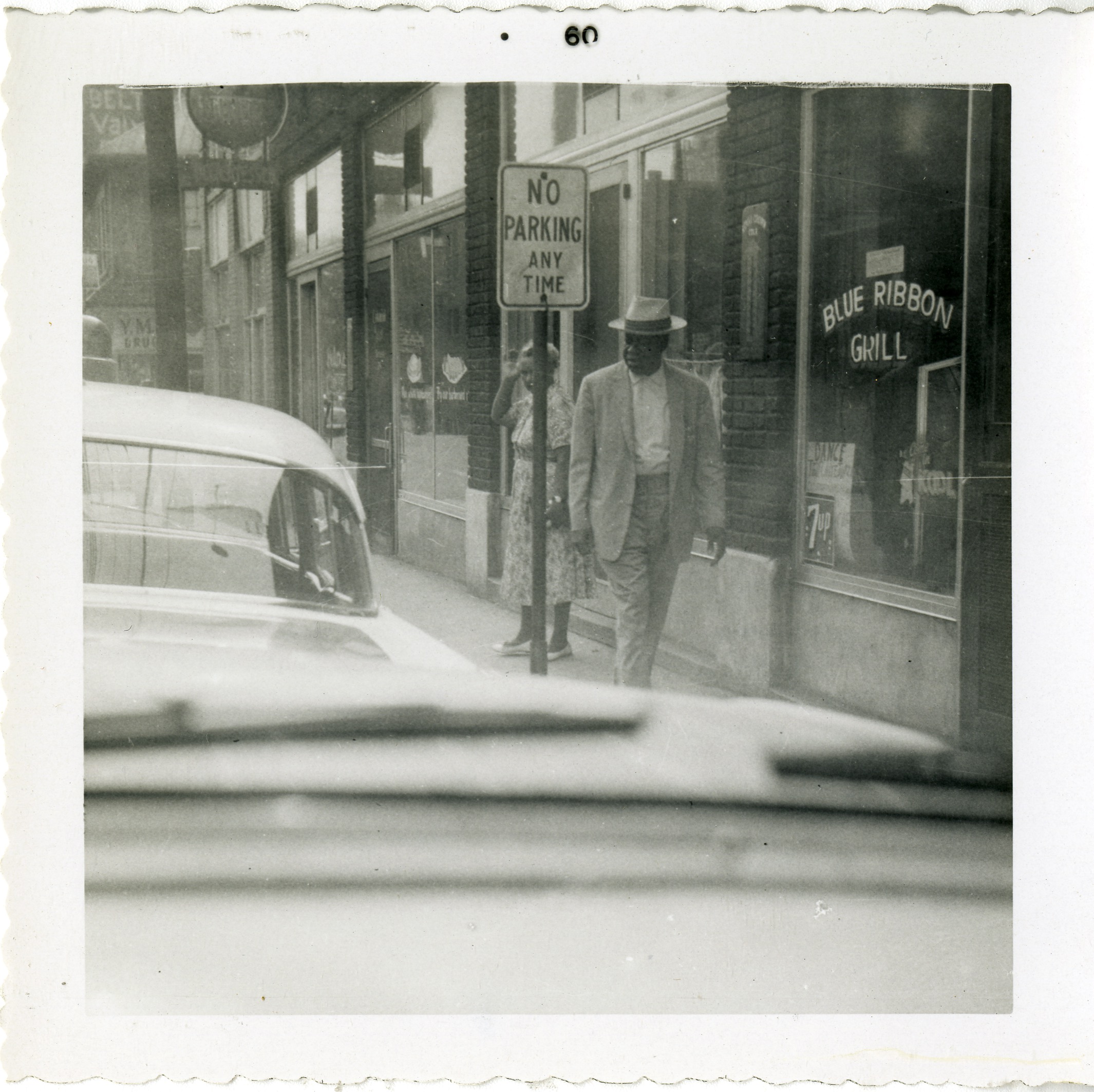 Scene of Eagle Street in front of Ebony Grill &amp; Blue Ribbon Grill, 1960