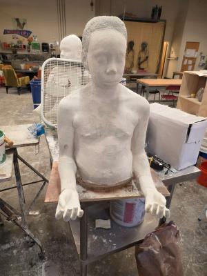 Casting of upper body of boy