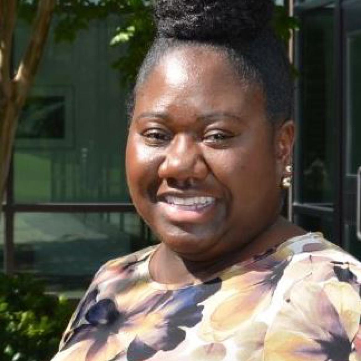 Marquita Robertson, NC ABLE Board member, headshot image in outside environment