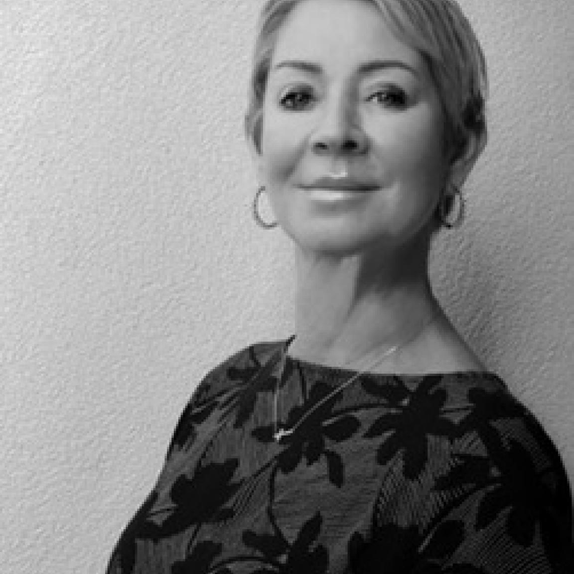 Claudine Burns, NC ABLE Board member, in a professional headshot image in black and white