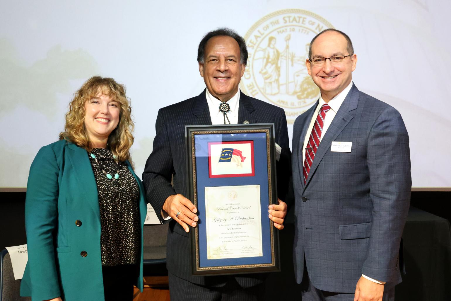 Commission of Indian Affairs Executive Director Greg Richardson, Deputy Secretary Noelle Talley and Secretary Gabe Esparza