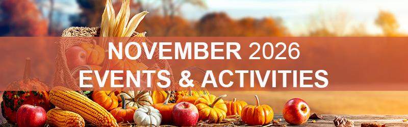 Basket of pumpkins, gourds and apples spilling over