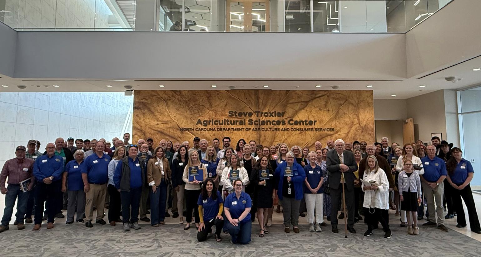 A group of people pictured inside at the event.