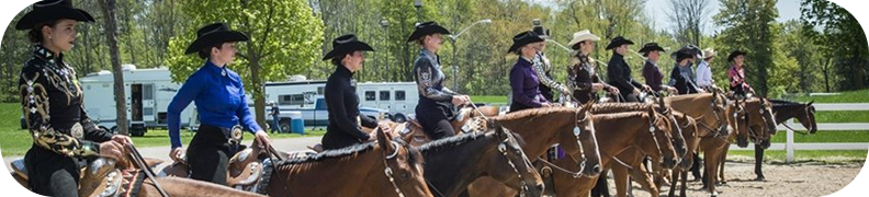 Girls in Cowboy Hats Sitting on Horses
