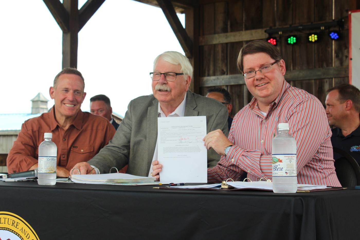 Agriculture Commissioner Steve Troxler signed an agreement with USDA Deputy Secretary Stephen Vaden for a $221 million federal ag disaster block grant.