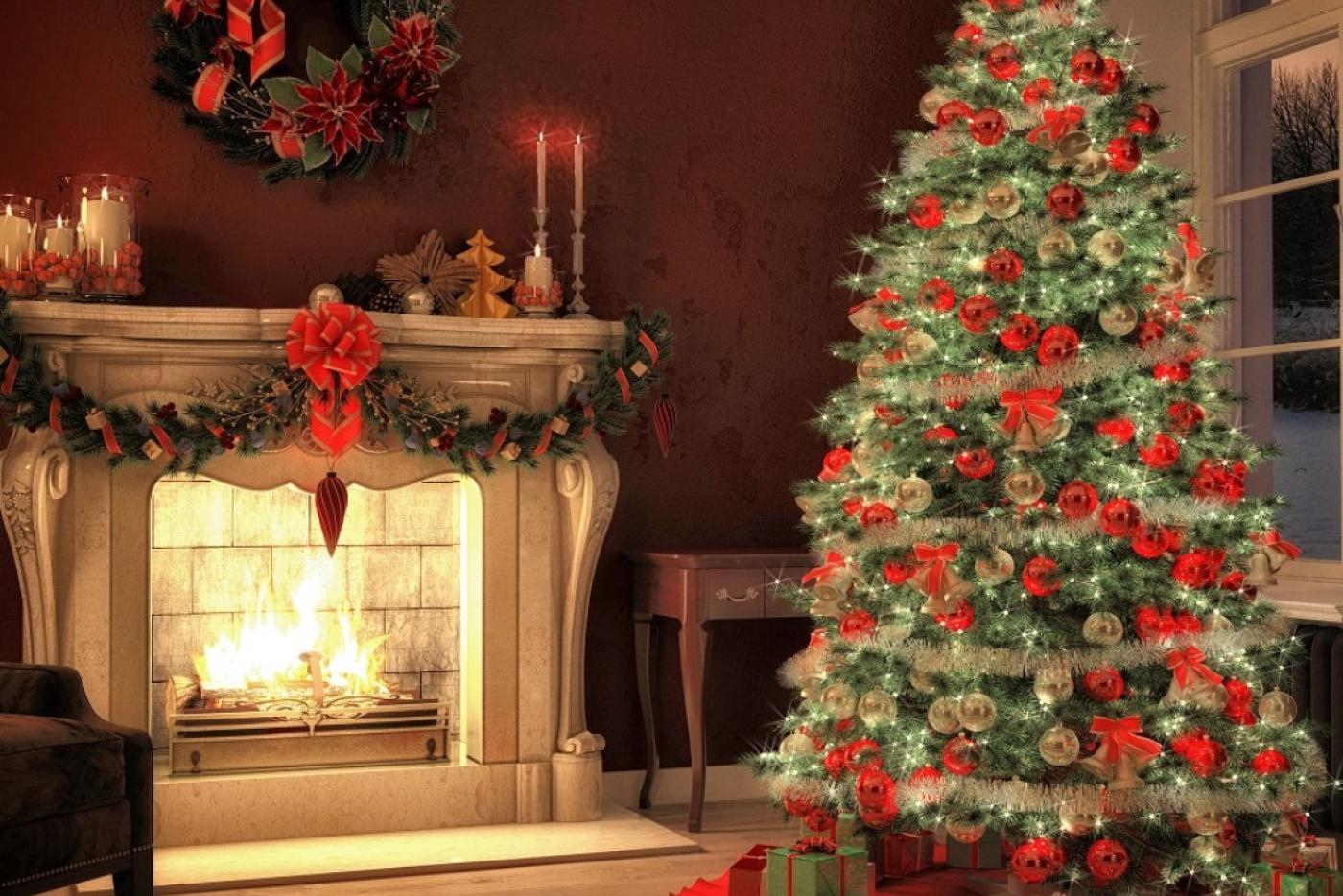 Christmas tree and fire in fireplace