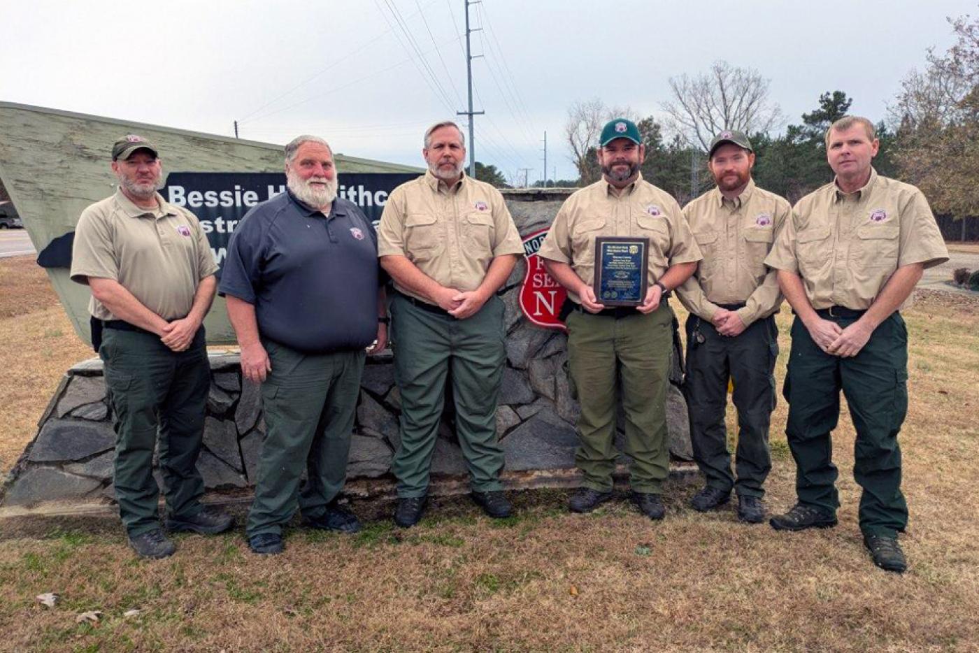 Warren County Staff being presented the Moreland Gueth award plaque