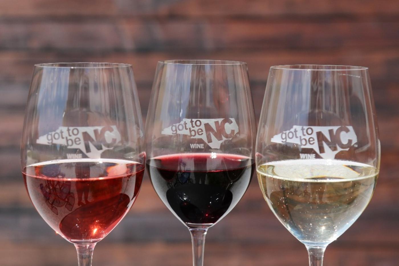 three glasses of red and white wines