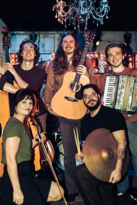 Group of friends holding instruments 