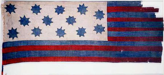 Red and blue stripped flag with blue stars on a white background