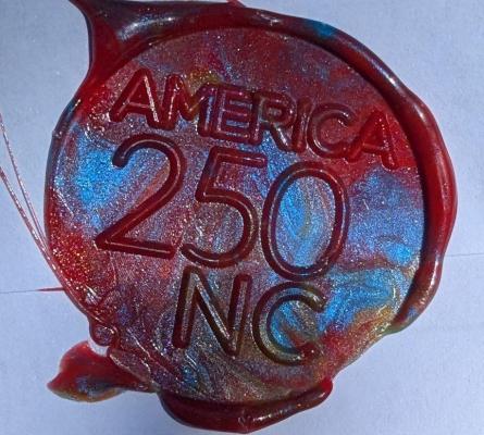 Closeup of a wax seal with the America 250 NC logo