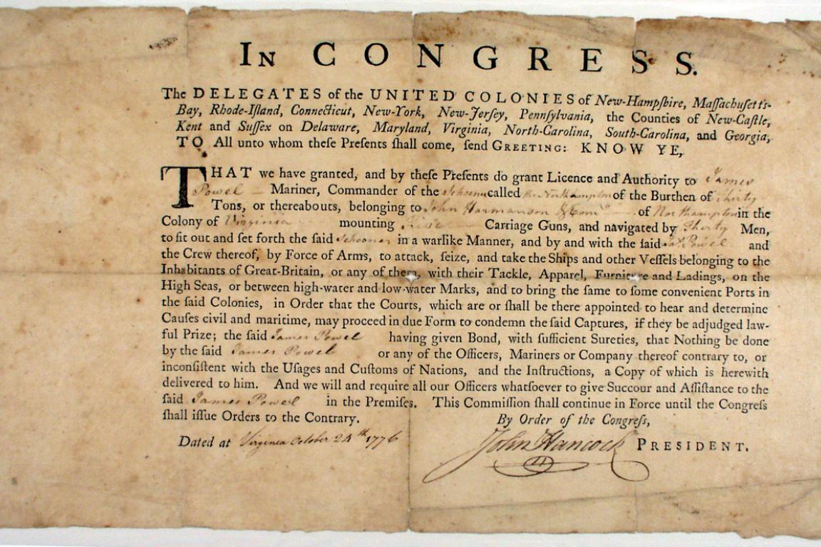 Letter of Marque issued by John Hancock - a printed document with certain information filled in by hand. It is very worn around the edges and shows evidence of having been folded in quarters.