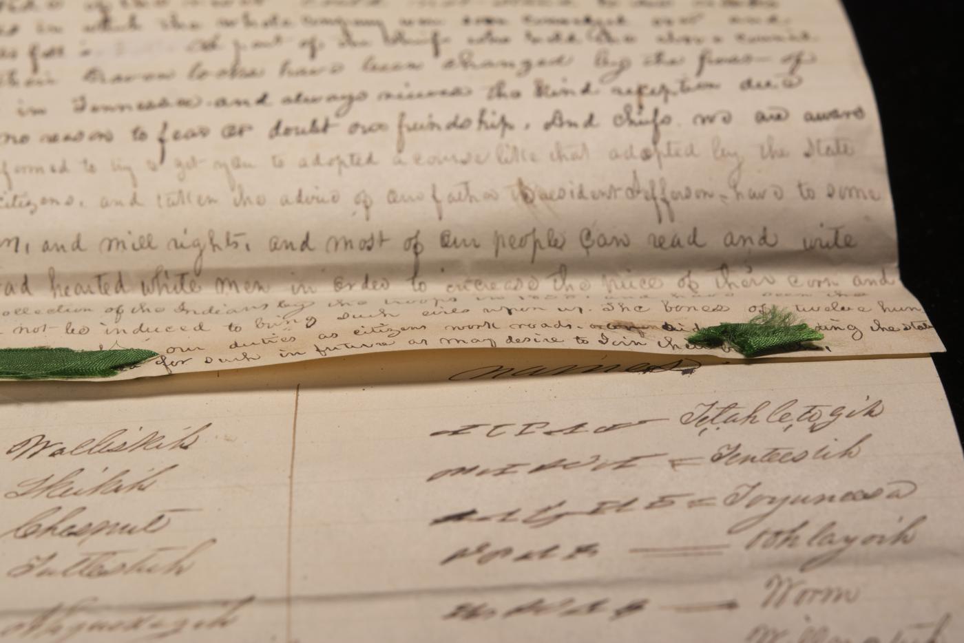 Historic manuscript document with handwritten text and signatures.