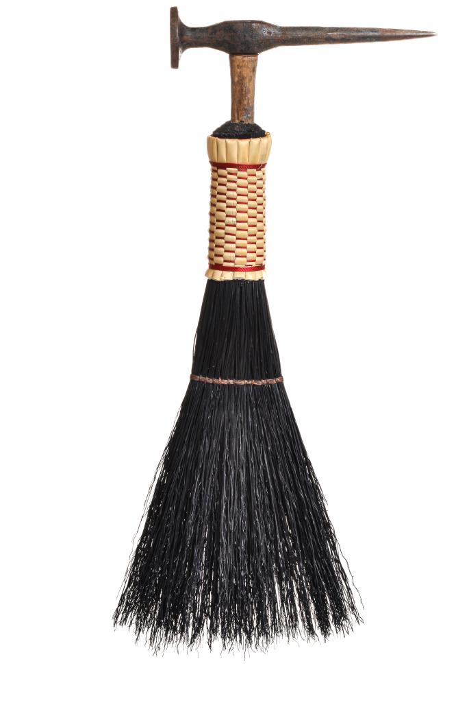 A handmade broom by artist Sally Morgan Guérard