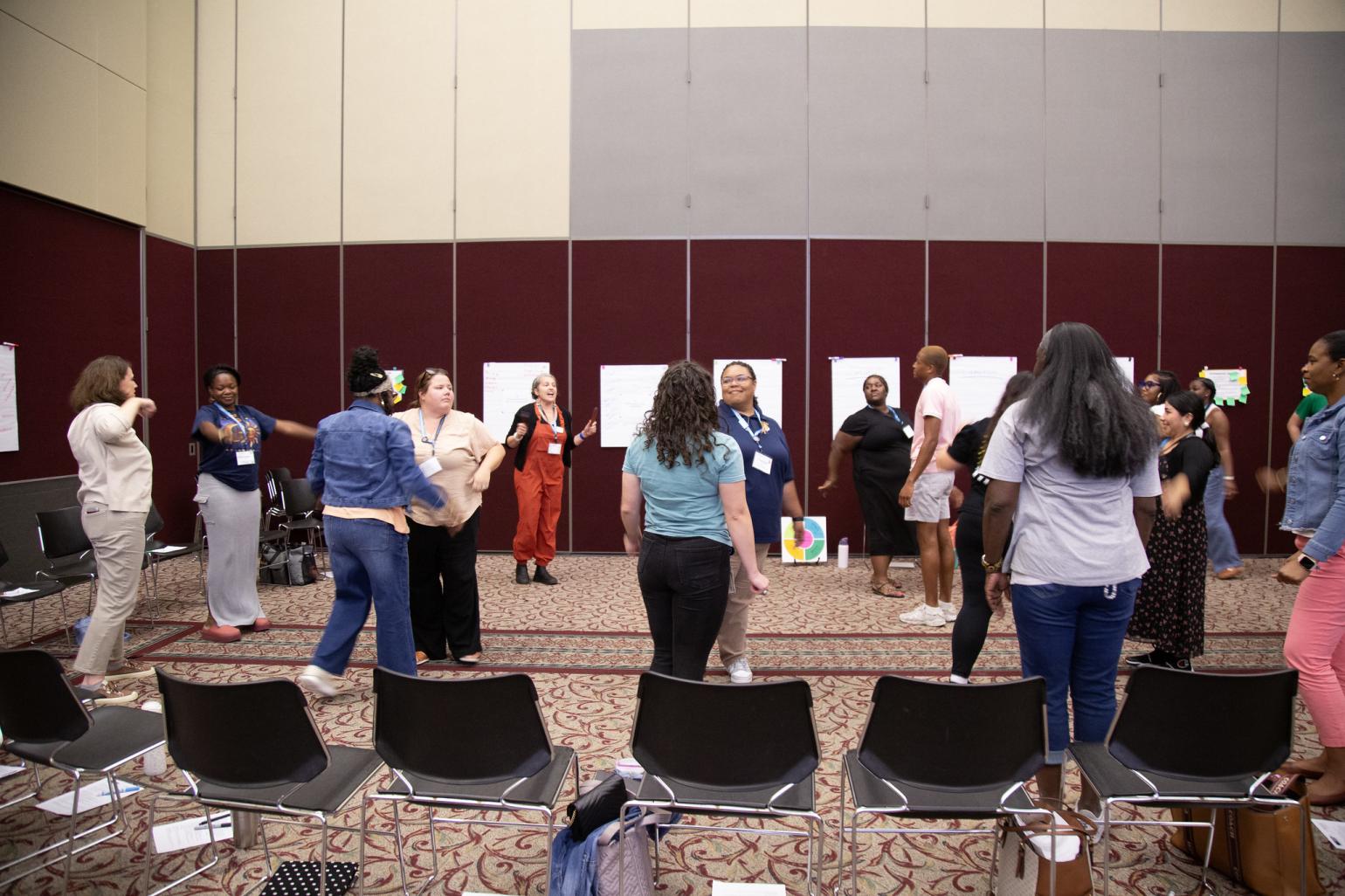 Teachers at an A+ summer conference
