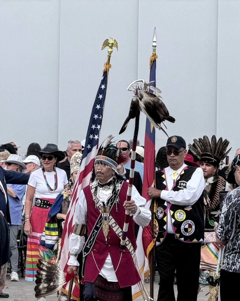 Grand entry at the 2025 AIHC Celebration, Secretary Pam Cashwell can be seen in the procession