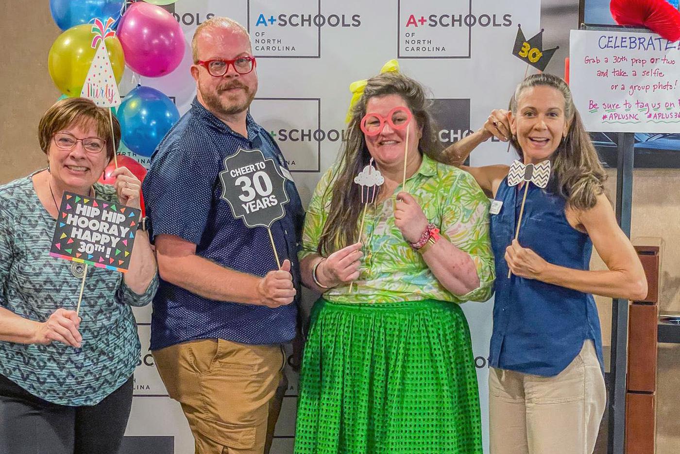 A+ Schools staff celebrate A+ 30th birthday. L to R: Michelle Burrows, Tom Nevels, Laura Walters, and Jennifer Huggins. Photo courtesy of N.C. Arts Council  