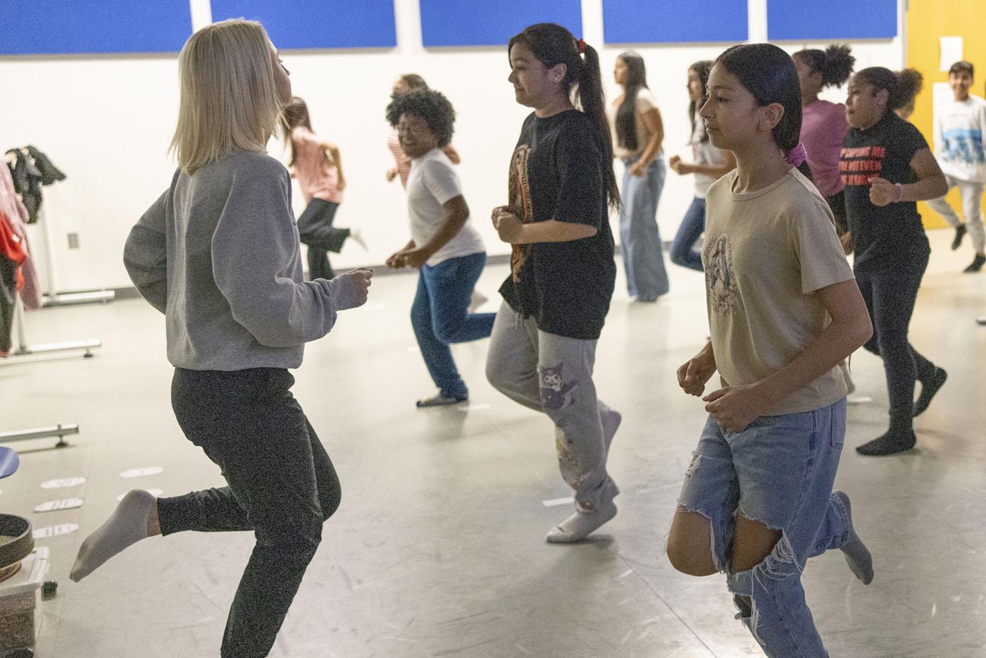 A teacher leads a dance class. Photo by Tibor Nemeth, courtesy of NC Arts Council.