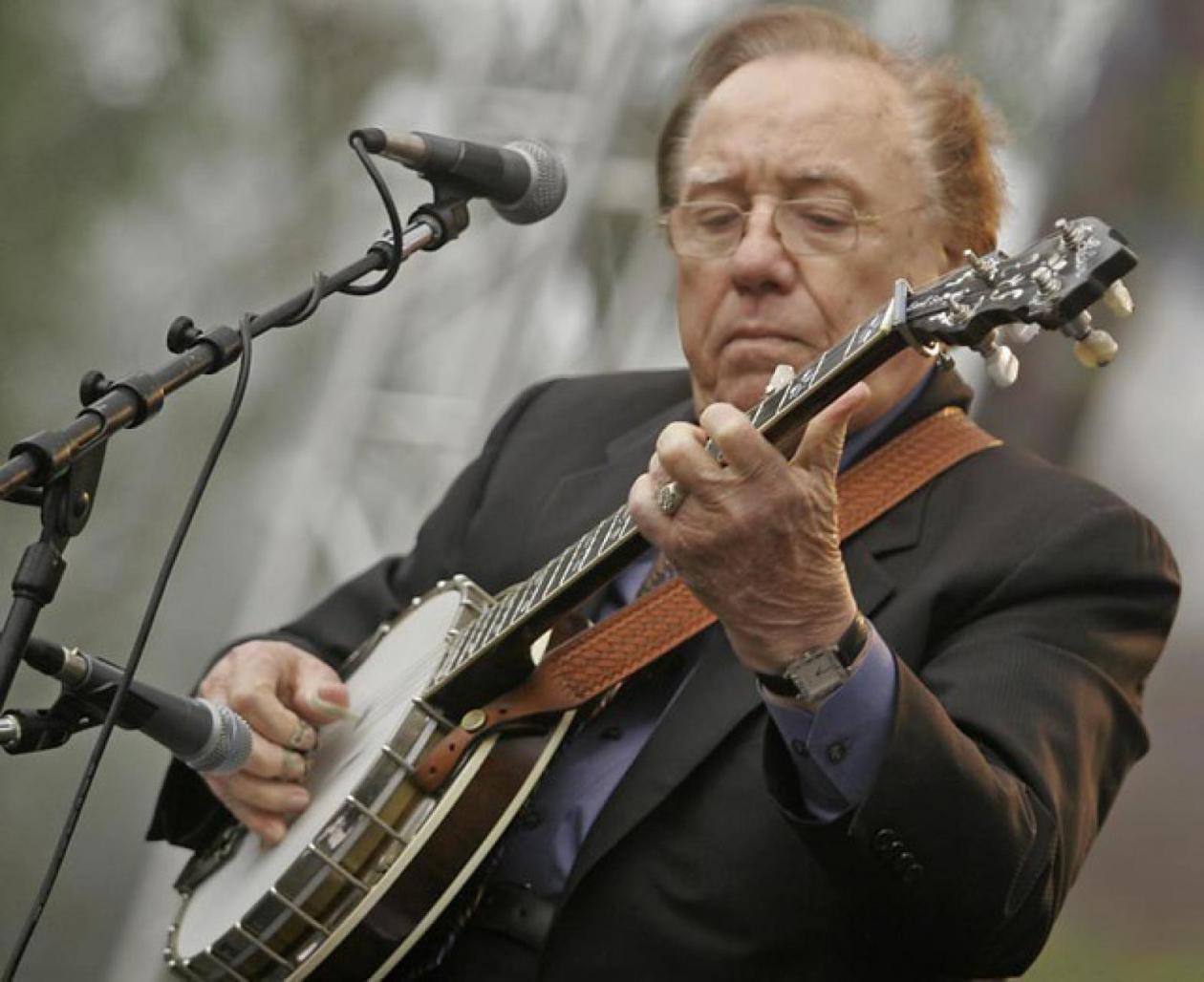 Earl Scruggs performing on the banjo