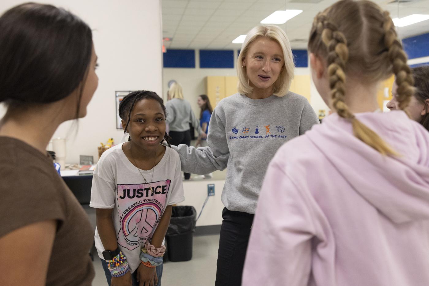 A teacher speaks with students at Royal Oaks School of the Arts. Photo by Tibor Nemeth, courtesy of NC Arts Council. 