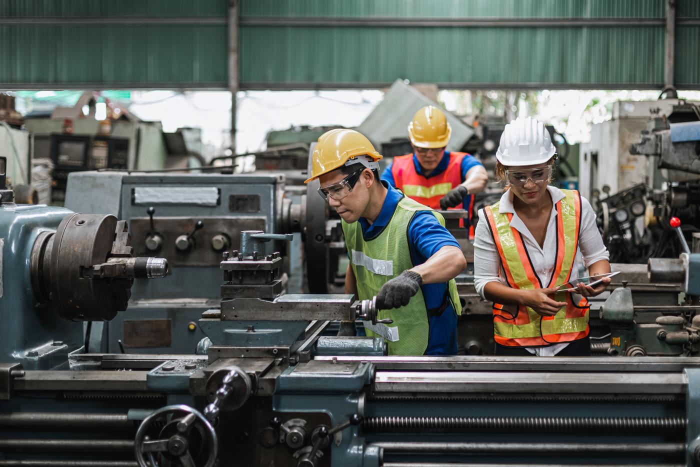 manufacturing employees working at a manufacturing plant