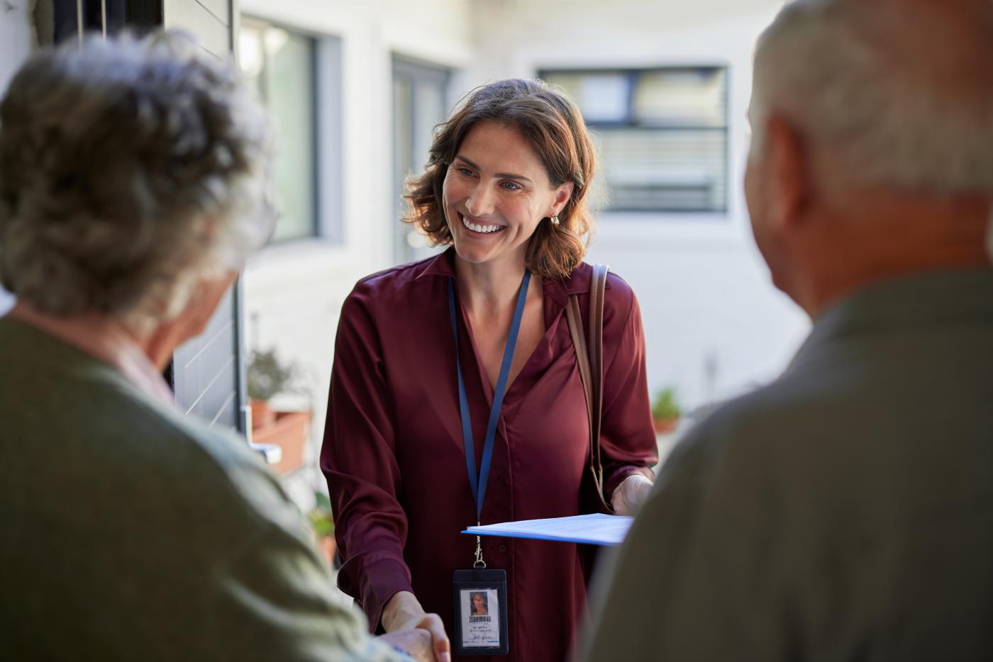 social worker meeting elderly couple