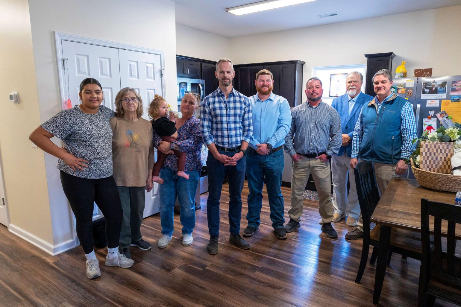 Group photo inside of kitchen