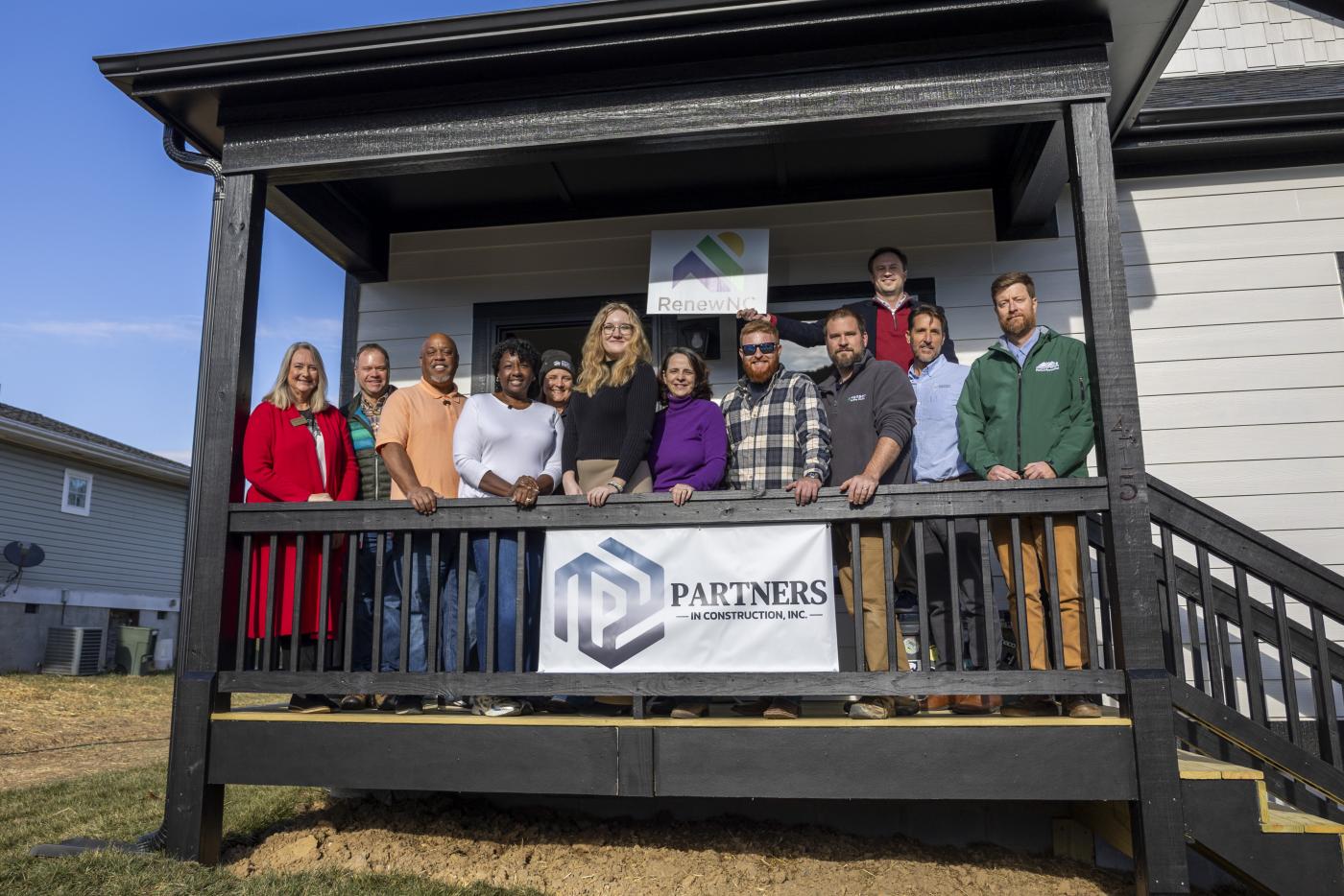 Large group photo on front porch