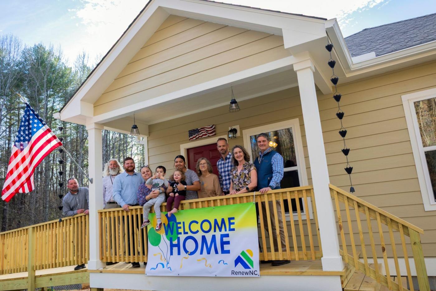 People gathering on front porch of Renew NC home
