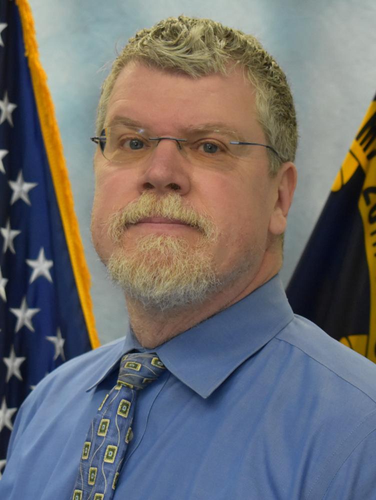 man with white hair and white beard