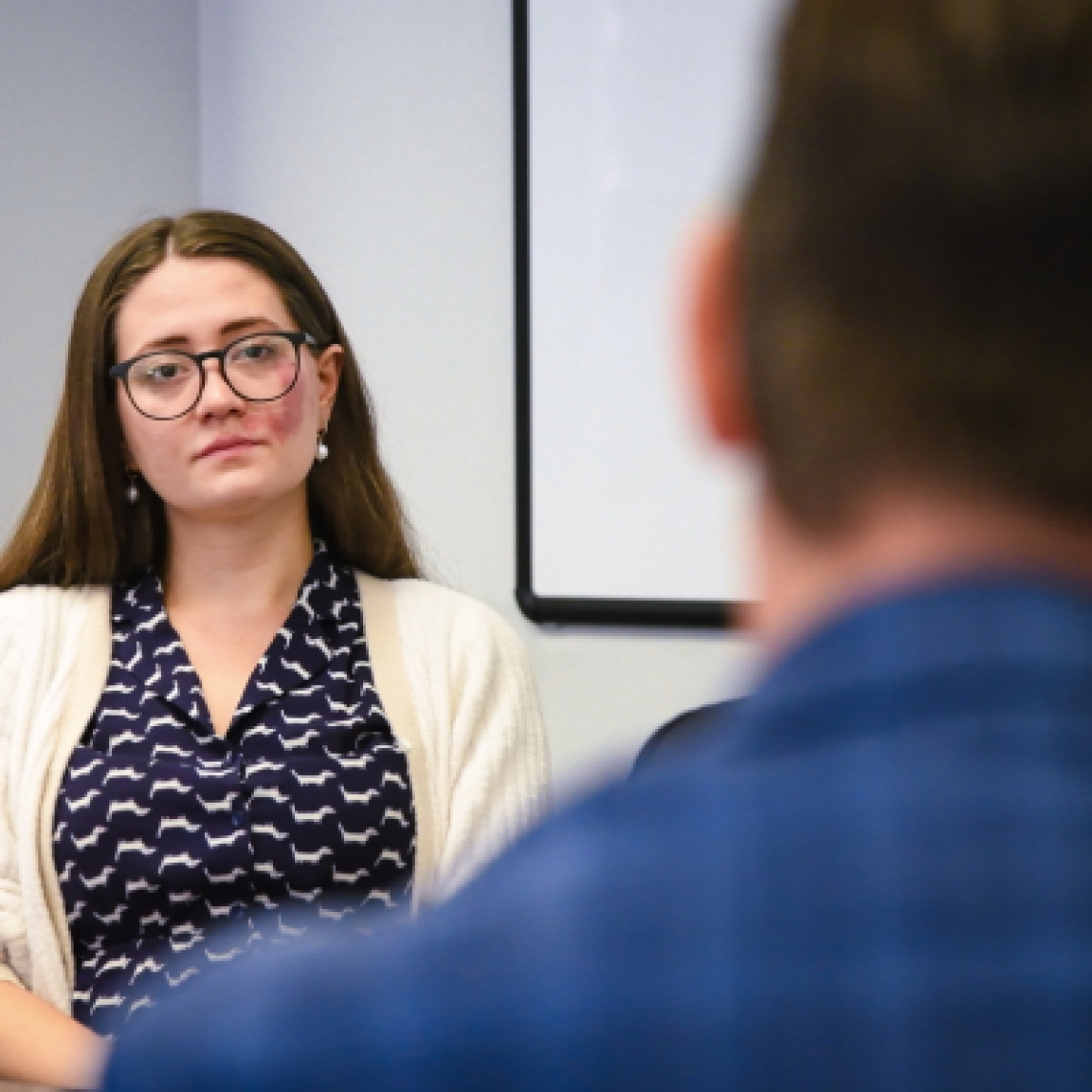 an intern meets with offender to provide treatment