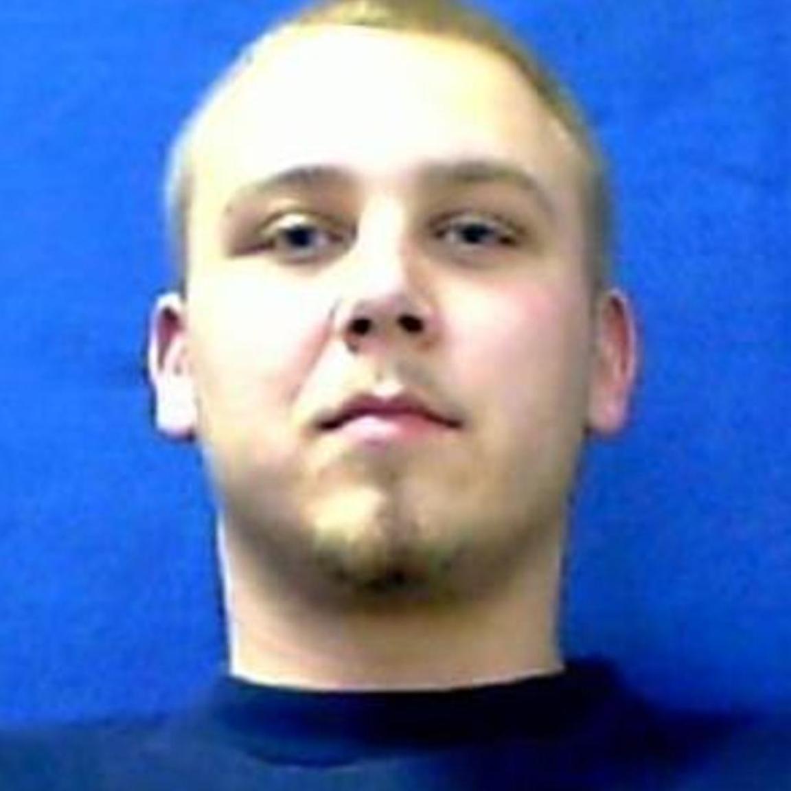 young white man with mustache and short beard and blond hair