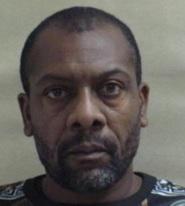 Tyrus Sanders, 49-year-old Black man with short full beard.