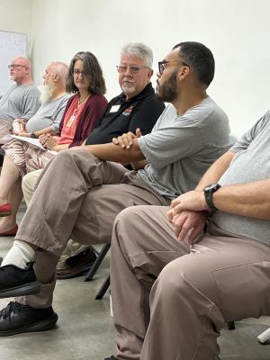 Students discuss a point during class