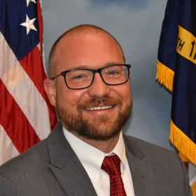 man with balding head and beard