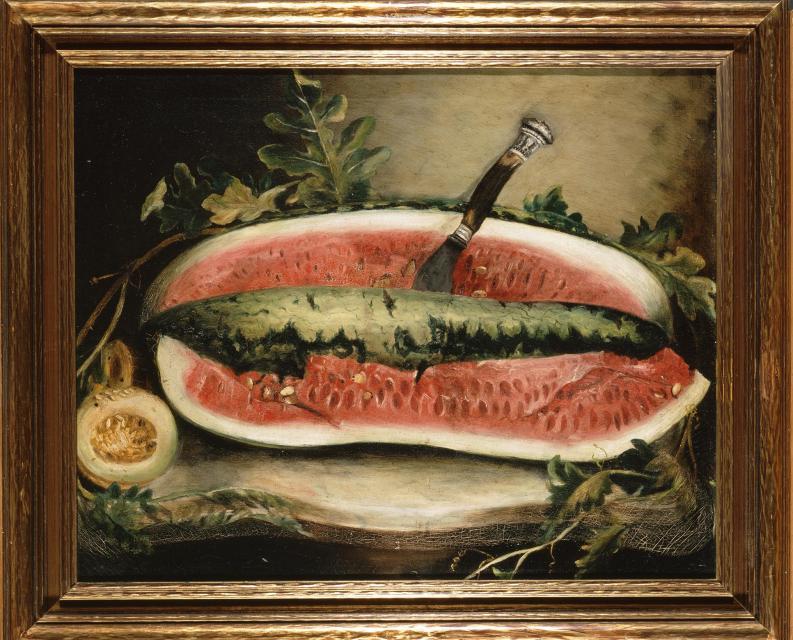 A painting with a wood frame showing a watermelon with a long slice missing. A knife is stuck into the middle of the fruit. 