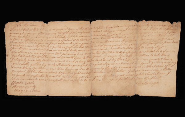 The cursive text, written on aged paper with visible vertical fold lines, discusses the "growing Weight of oppression" and mentions the formation of a company of about 500 men.