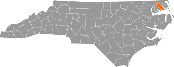 A gray map of North Carolina with Pasquotank County filled in with orange.