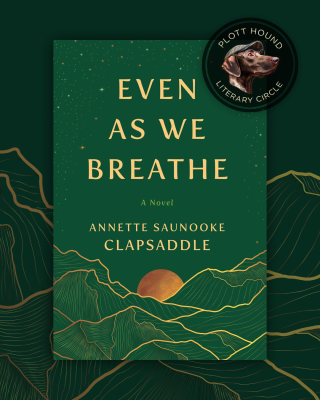 Book cover of "Even As We Breathe" by Annette Saunooke Clapsaddle. The design features stylized green mountains with a setting sun and a starry sky. A circular badge in the top right corner reads "Plott Hound Literary Circle.
