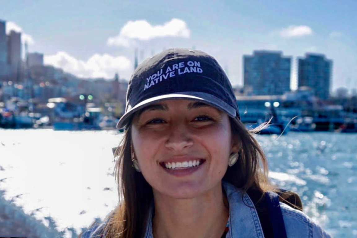 Jocelyn Painter with water and skyline behind her