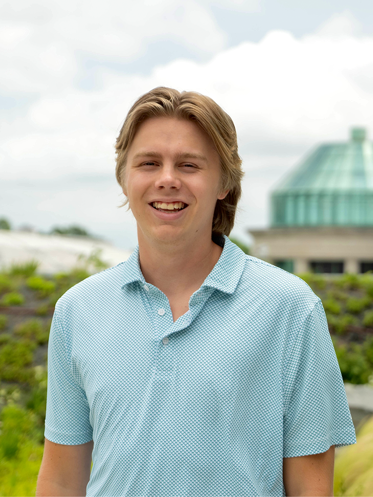 Dylan Skinner portrait on roof of NC Museum of Natural Sciences