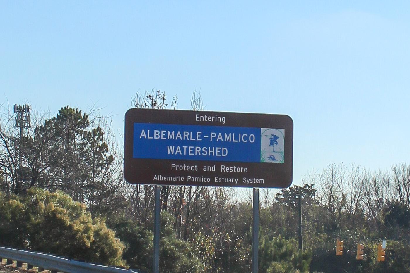 Highway sign stating "Entering the Albemarle-Pamlico Watershed."