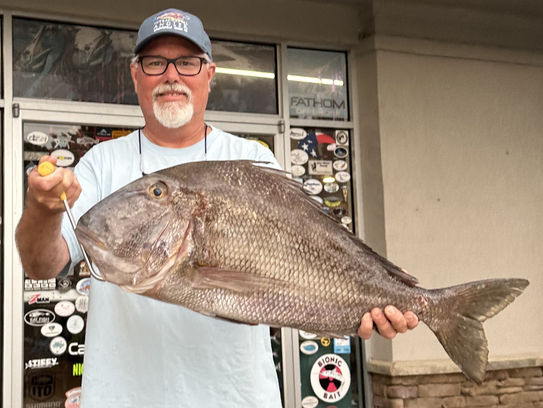 Man holding a Jolthead Porgy State Record Fish