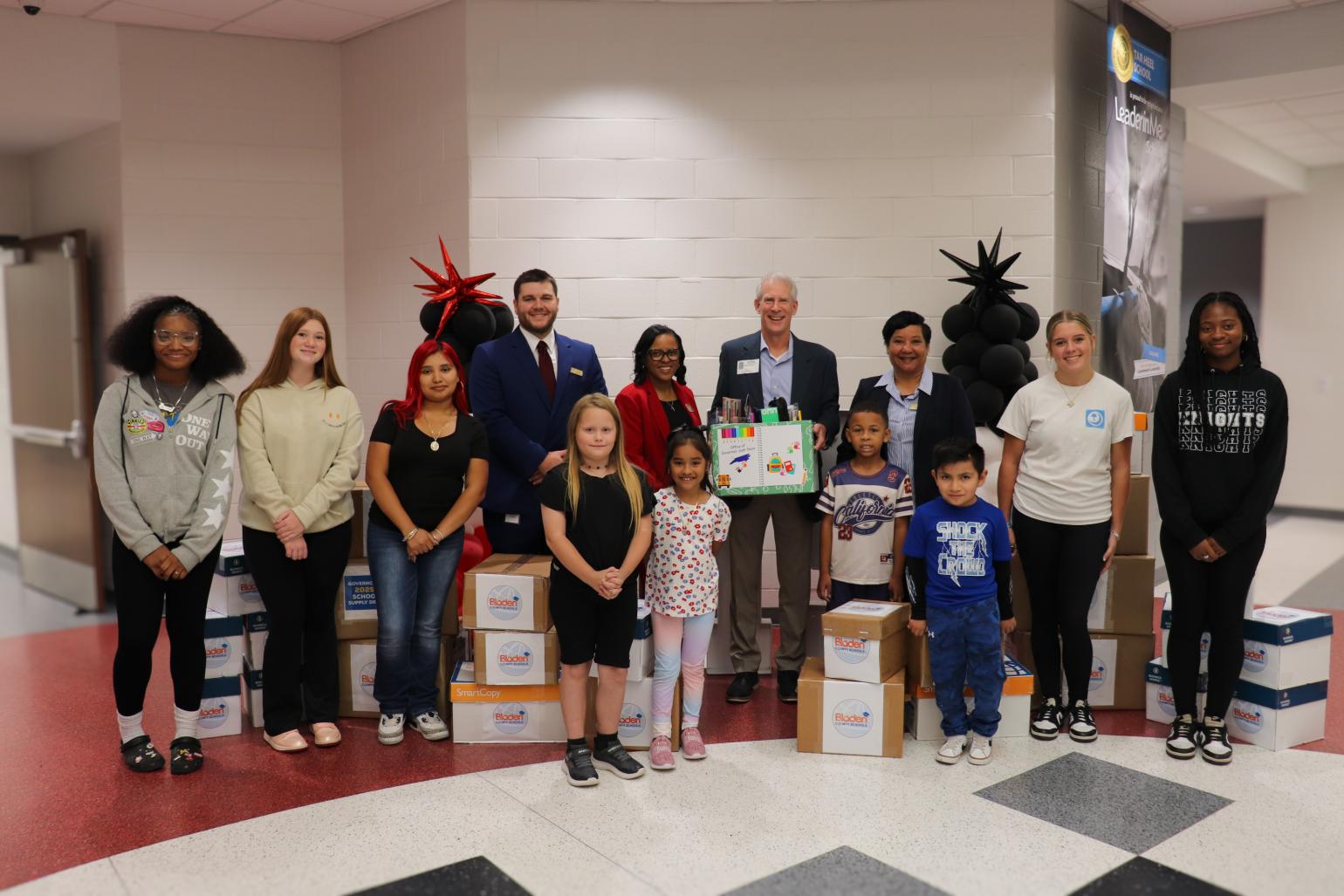 Secretary Wilson drops off school supplies at Tar Heel School.