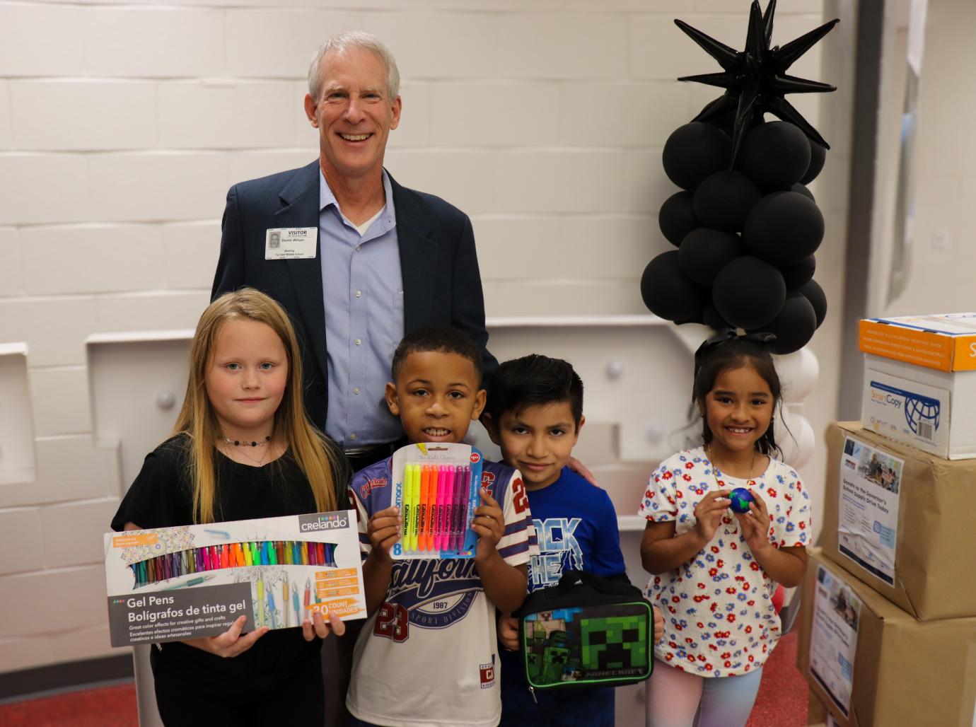 Secretary Wilson drops off school supplies at Tar Heel School.