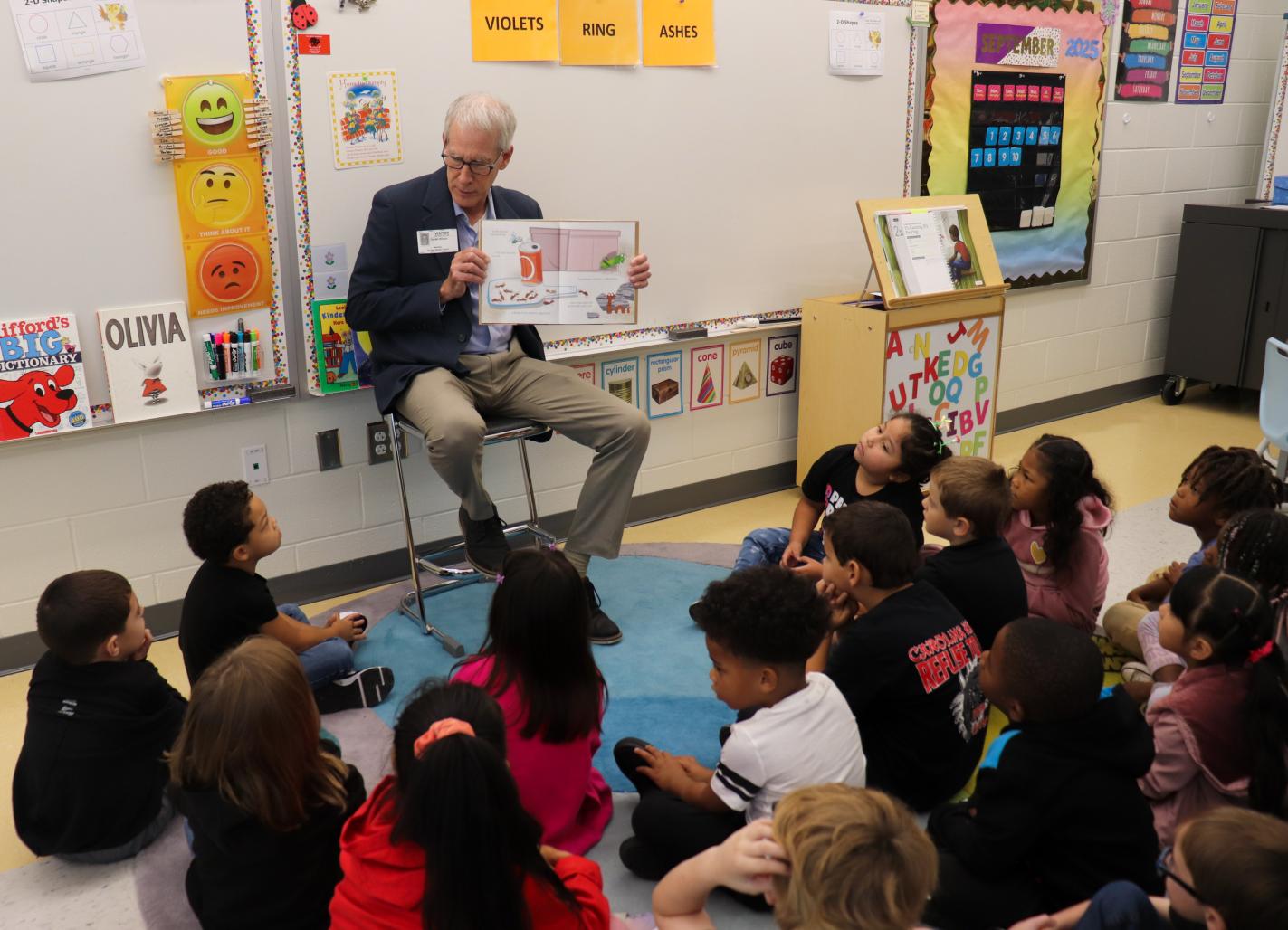 Secretary Wilson reads to students at Tar Heel School.