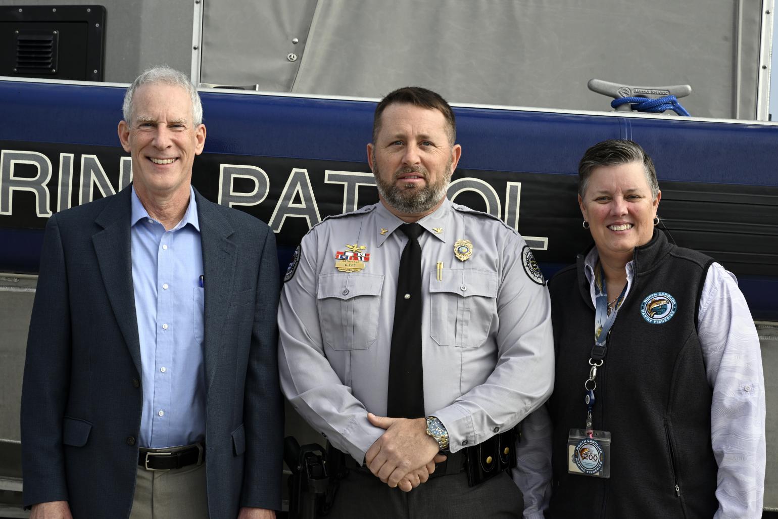 Chris Lee with Secretary Reid Wilson and DMF Director Kathy Rawls