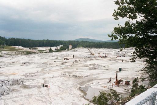 View of the former Mt. Airy granite quarry with mining equipment and quarry walls shown