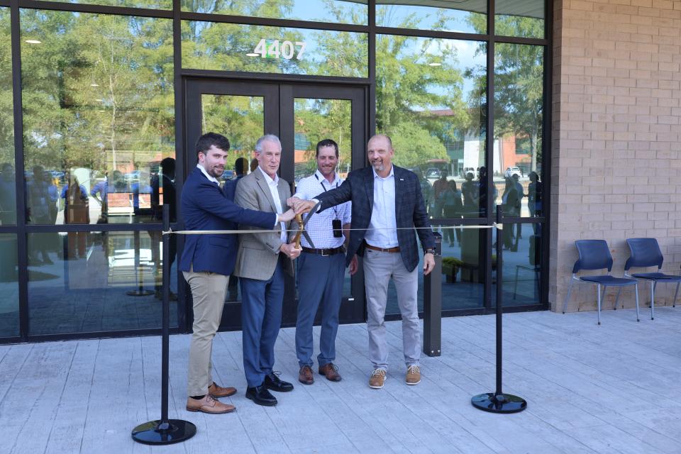 From left: H&H Architect Jackson Kiel, DEQ Secretary Reid Wilson, DEQ Director of Facilities, Health & Safety Todd Stevens; and Skanska USA Senior Vice President Ben Huffman cut the ribbon on DEQ's new Reedy Creek campus on Oct. 16, 2026.